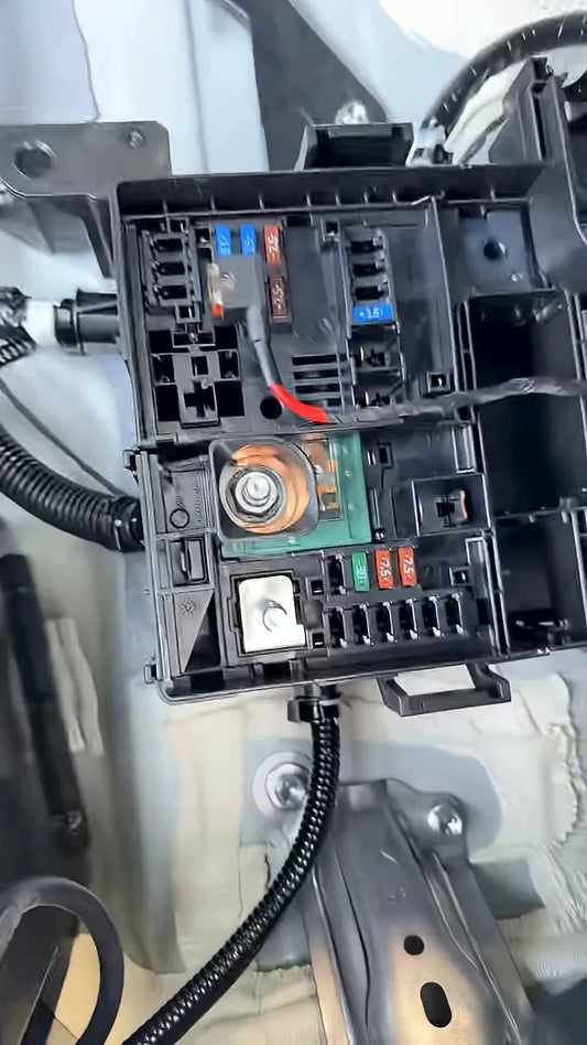 Rear fuse box in the 2026 Lexus RX350h with ignition fuse tap wiring connection