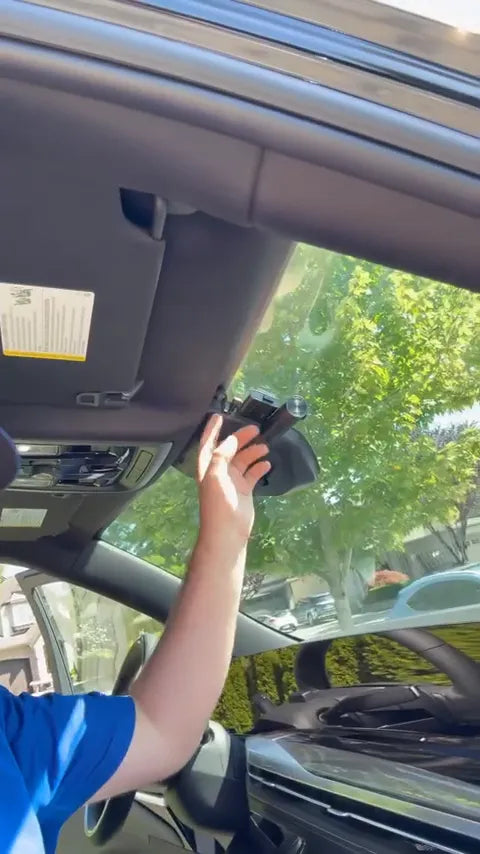 Front view of the 2025 Cadillac Escalade with dash cam installed on passenger side