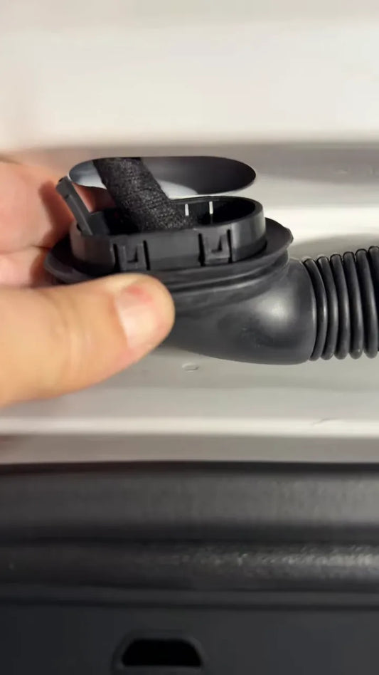 Close view of the upper liftgate rubber boot and retaining tabs